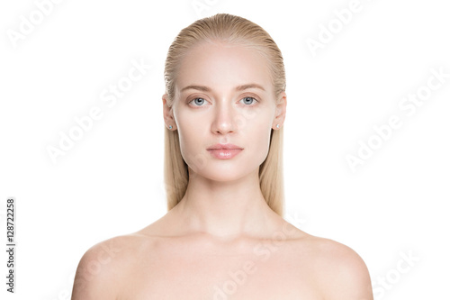 Portrait Of A Beautiful Young Blond Woman With Long Slicked Hair