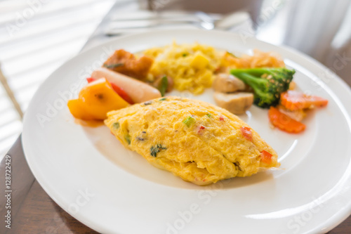 Closeup of egg omelette for breakfast .