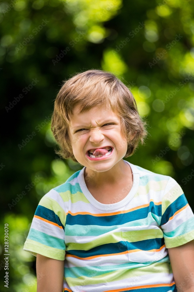 A little boy is making a funny face A little boy is making a funny face
