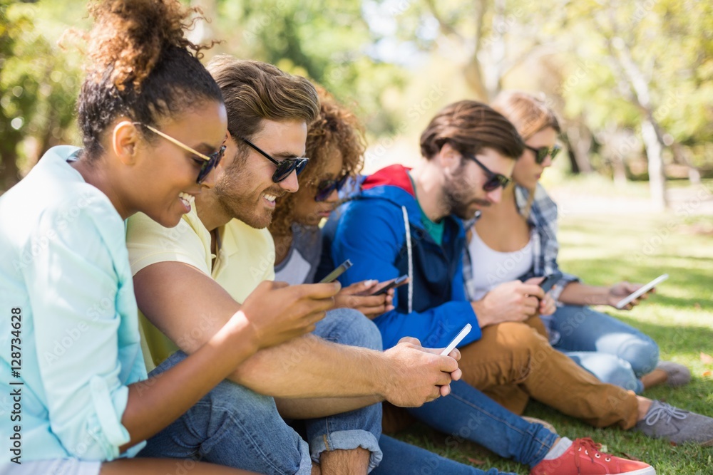 Group of friends using mobile phone Group of friends using mobile phone
