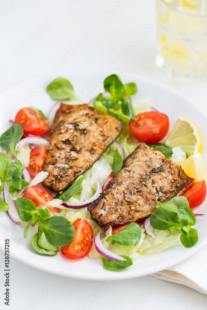 roasted mackerel fish with fresh salad,