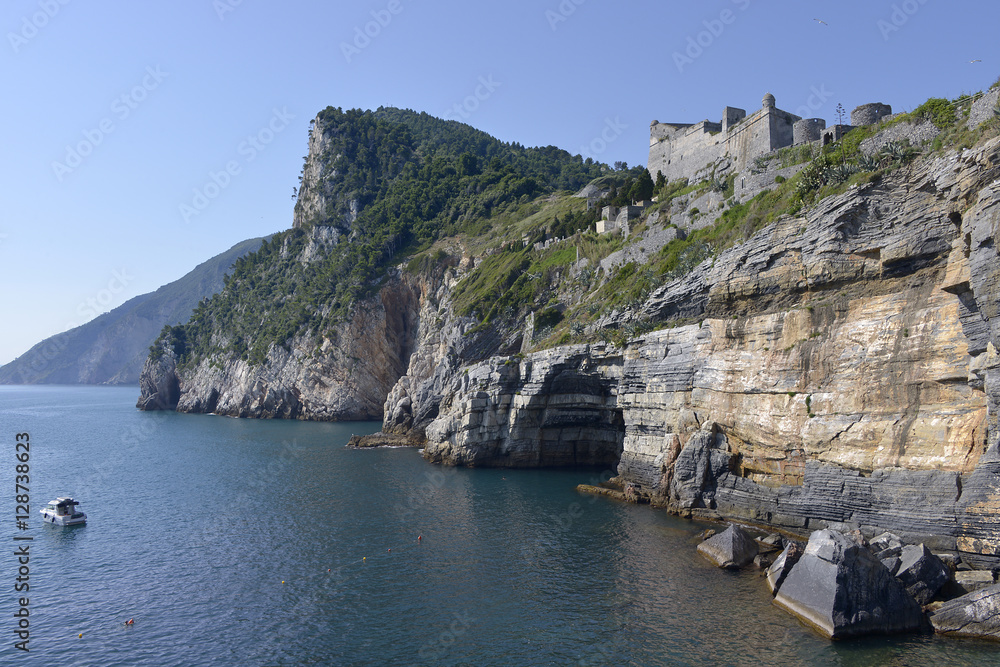 Rocky coastline and Doria castle on the cliff at Portovenere (or Porto Venere), is a town and comune located on the Ligurian coast of Italy in the province of La Spezia
