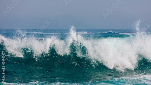 Massive rolling waves crashing into the rocks near Margaret beach, Western Australia