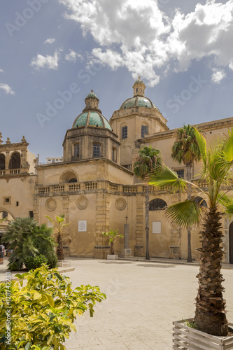 church with dome and blue sky with clouds