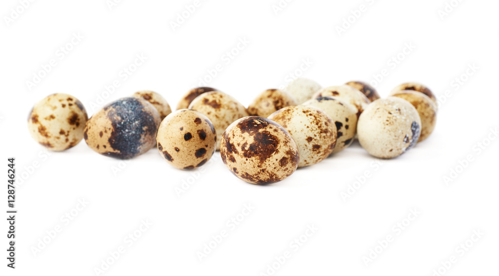 Quail eggs isolated over white background