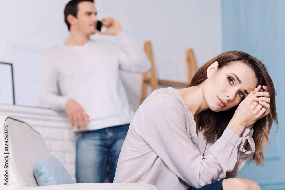 Gloomy distressed woman thinking about divorce. Gloomy distressed woman thinking about divorce.