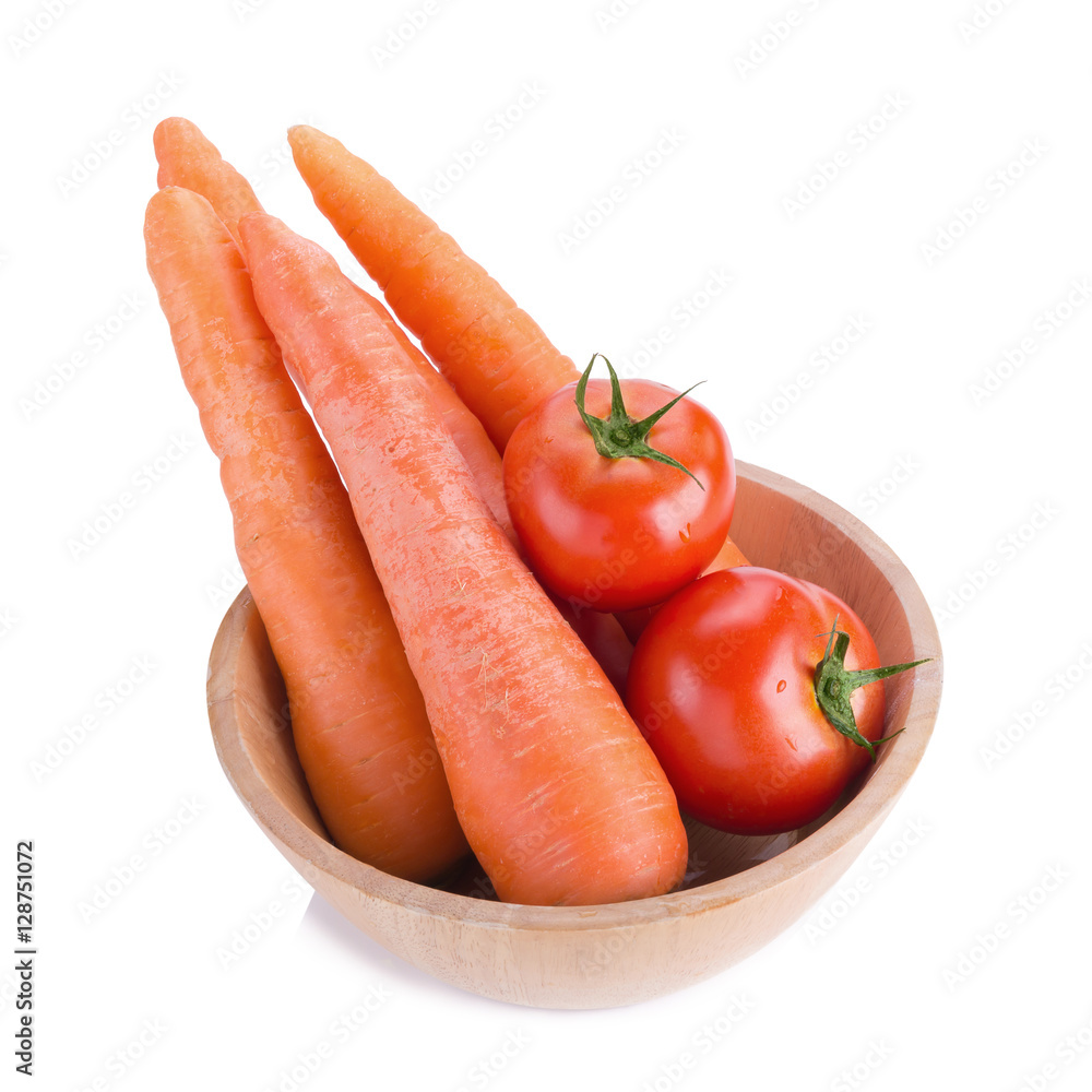 Carrots and tomatos isolated on white background. Carrots and tomatos isolated on white background.