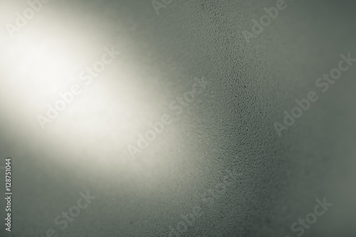 Sandblasted stainless steel background, empty space with beam of light for your project.