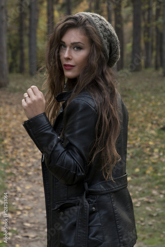 Beautiful fashion girl in forest