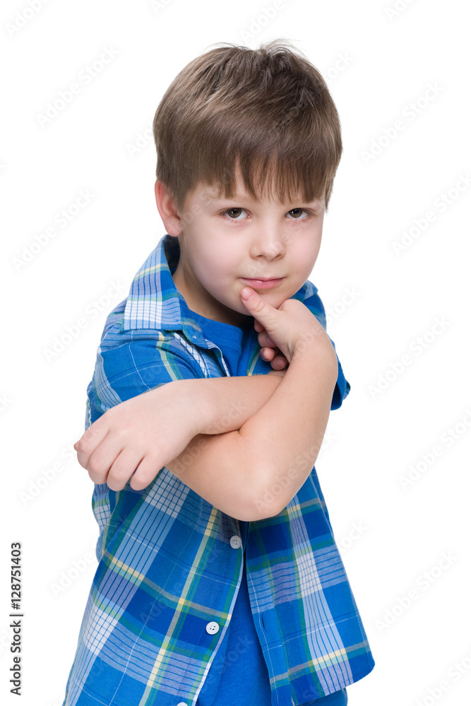 Pensive little boy on the white background Pensive little boy on the white background