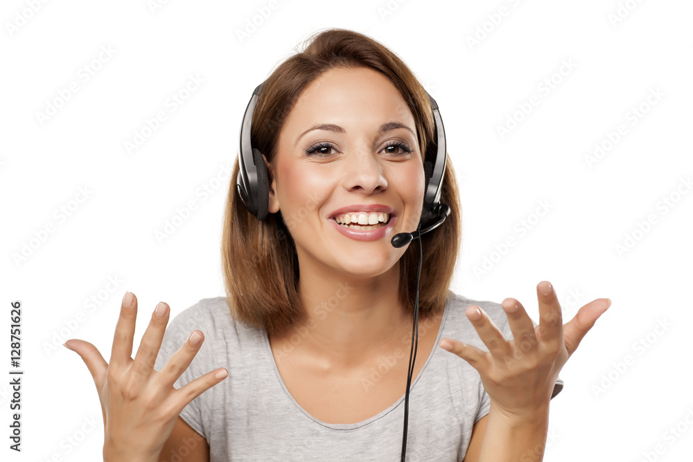 attractive and happy young woman with headset on her head attractive and happy young woman with headset on her head