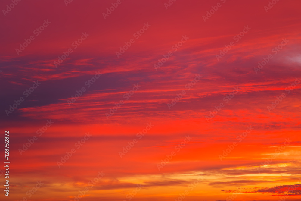 Fiery orange sunset sky. Beautiful sky as background.