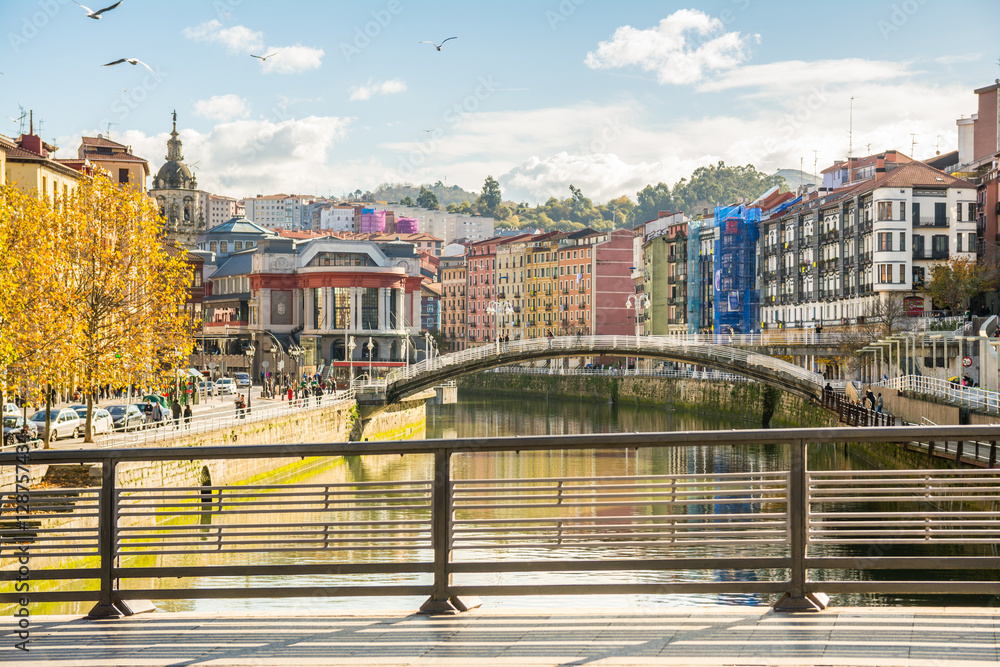 Naklejka premium bilbao riverbank on sunny day, spain