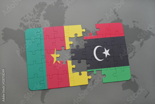puzzle with the national flag of cameroon and libya on a world map.