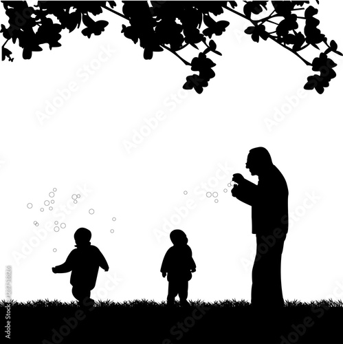 Grandfather playing with grandchildren, one in the series of similar images silhouette