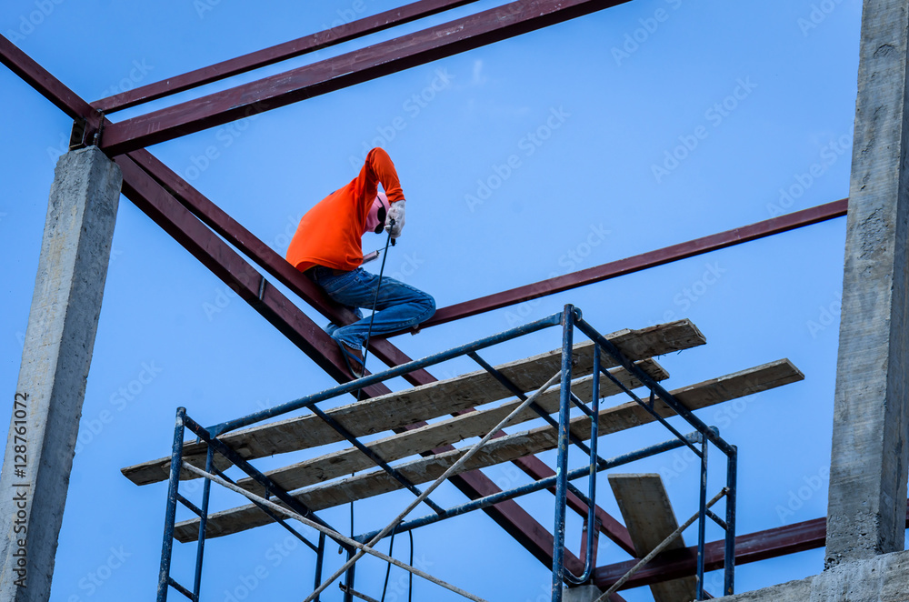 Construction workers working on high risk