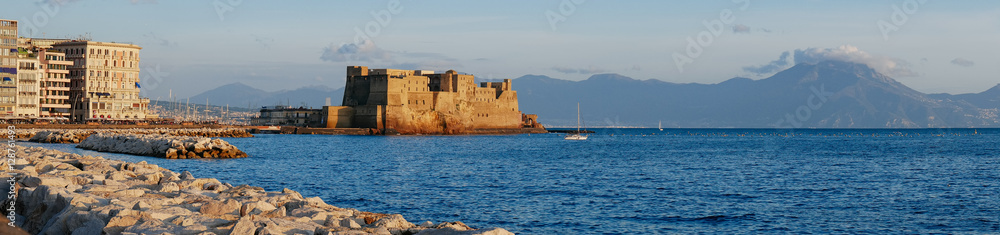 Castel dell Ovo at sunset in the bay of Naples italy