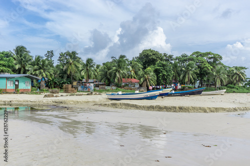 Corn Island, Nicaragua – August 17, 2016: beach view with people around. General travel imagery