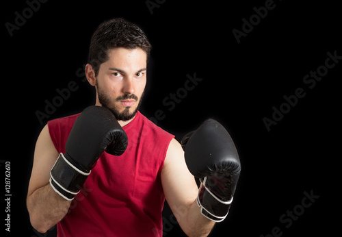 Male with red shirt with boxing gloves