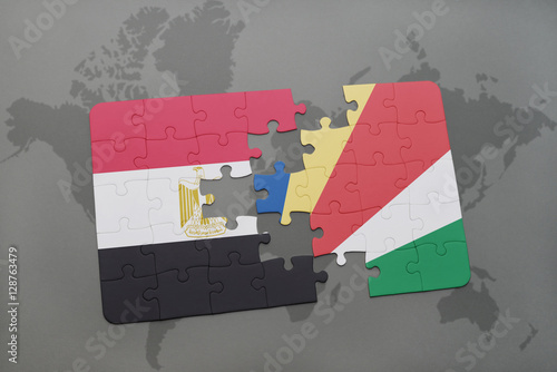 puzzle with the national flag of egypt and seychelles on a world map.