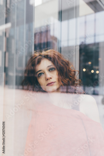 Free Download Double exposure portrait of young beautiful caucasian redhead woman posing outdoor in the city-  pensive, serious, thinking future concept - GFXLoad