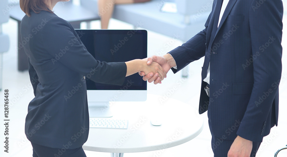 business handshake in modern office business handshake in modern office