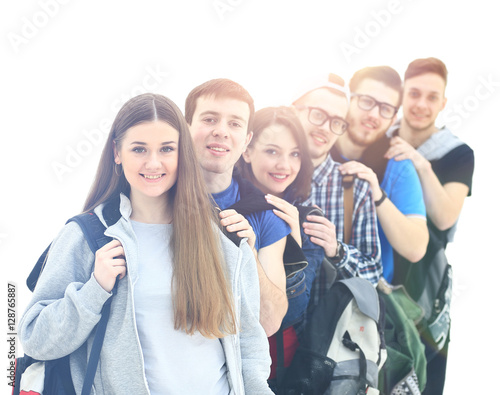 Happy young group of people standing togethe