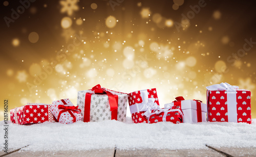 Wallpaper Mural Christmas gift boxes and balls on snow. Torontodigital.ca