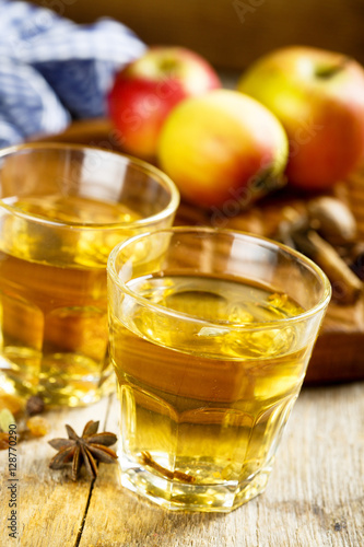 Hot cider with spices in glasses