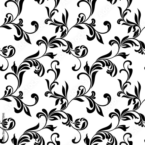 Seamless pattern with white floral tracery on a white background