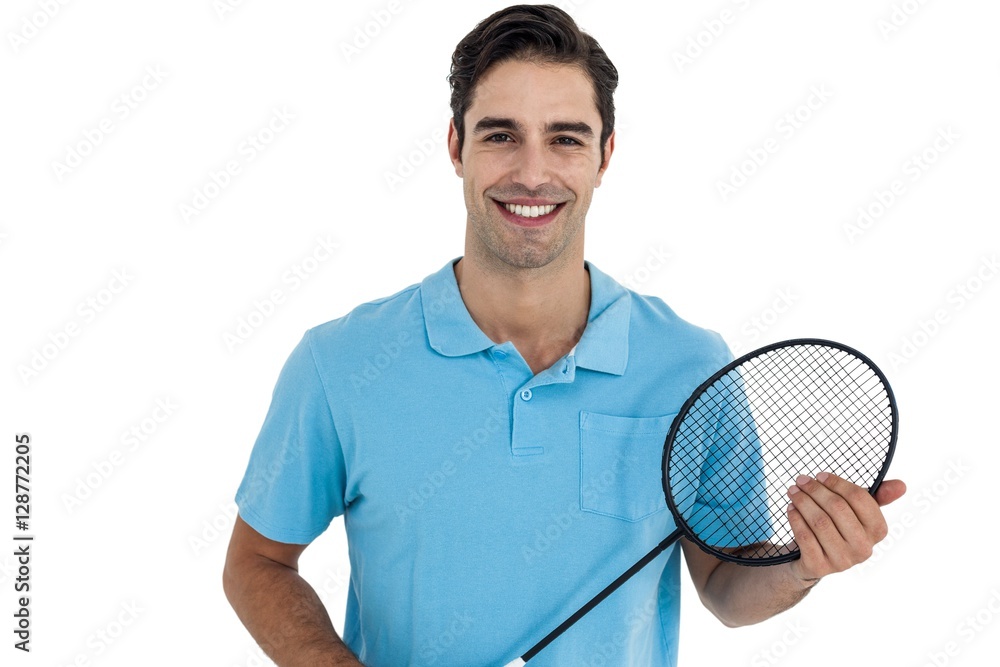 Portrait of badminton player holding badminton racket