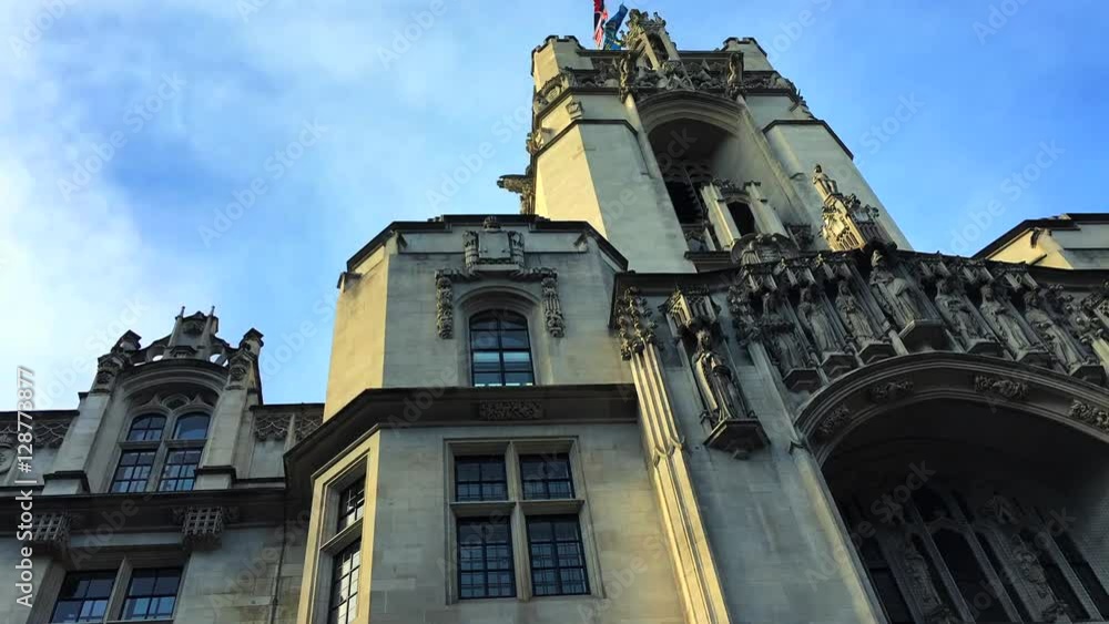 Time lapse clouds moving above the Supreme Court of the United Kingdom in the public Middlesex Guildhall building in Parliament Square in London Time lapse clouds moving above the Supreme Court of the United Kingdom in the public Middlesex Guildhall building in Parliament Square in London