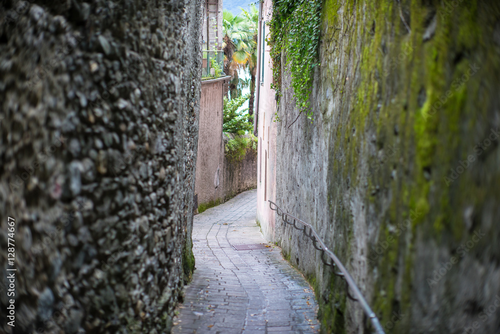 Old streets of ancient Italian town. Como lake.