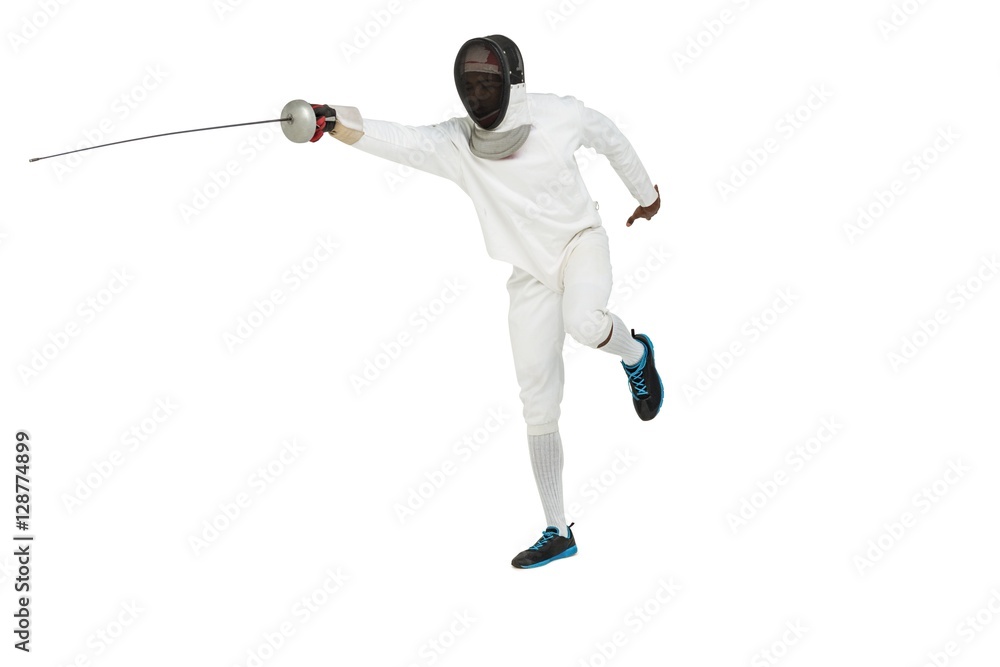 Man wearing fencing suit practicing with sword Man wearing fencing suit practicing with sword