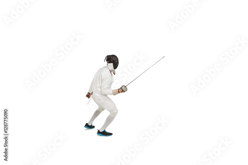Man wearing fencing suit practicing with sword © WavebreakmediaMicro