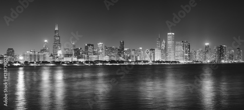 Black and white night panoramic picture of Chicago city skyline, USA.