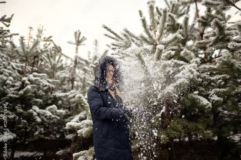 girl in a pine forest in the snow girl in a pine forest in the snow