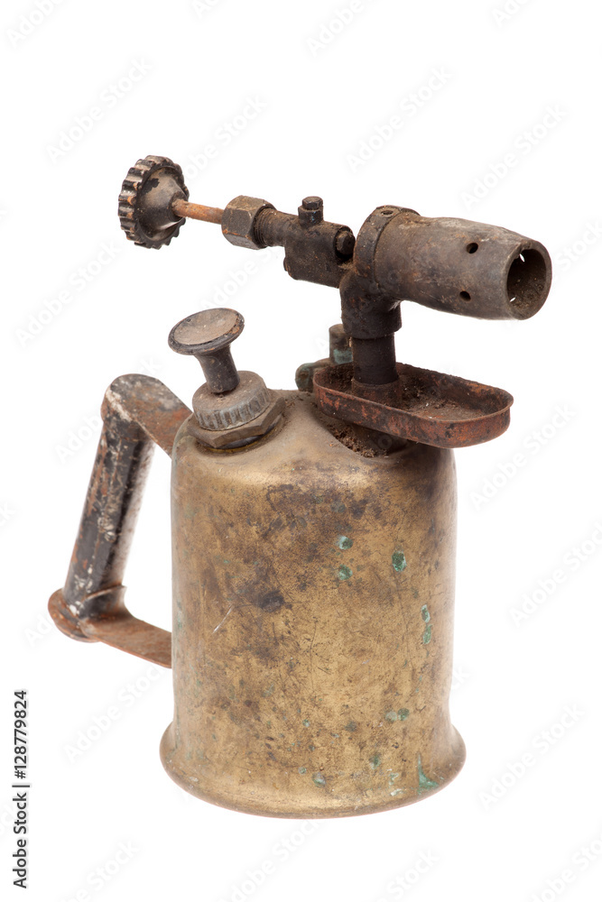 Old rusty blowtorch isolated on white Old rusty blowtorch isolated on white