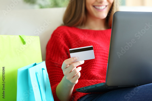 Girl buying on line with credit card