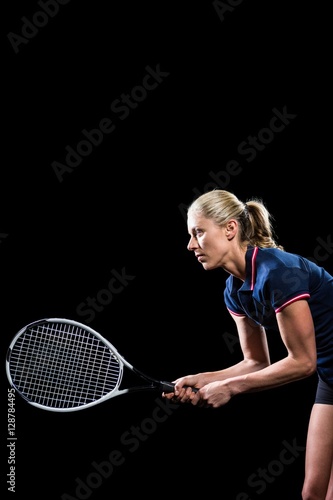 Tennis player playing tennis with a racket  © WavebreakmediaMicro