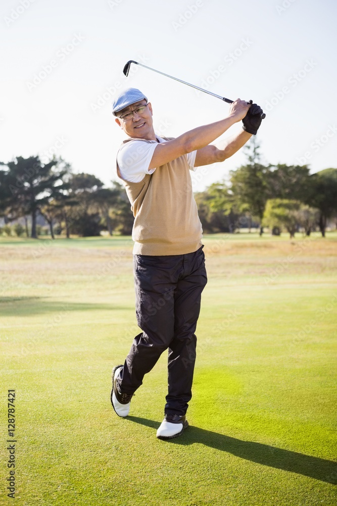 Portrait of sportsman playing golf Portrait of sportsman playing golf