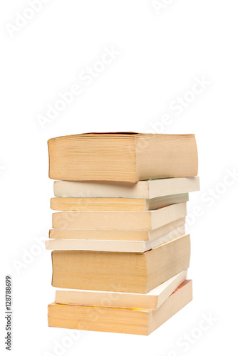 Stack of old paperback books isolated with copyspace