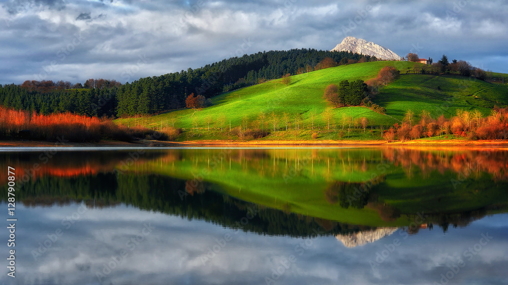 reflections in Urkulu lake in Basque Country