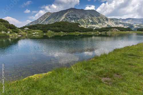 Fototapeta Naklejka Na Ścianę i Meble -  Panorama with Todorka Peak and reflection in Muratovo lake, Pirin Mountain, Bulgaria
