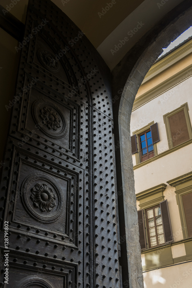 Close up of an arched doorway in Florence, Italy