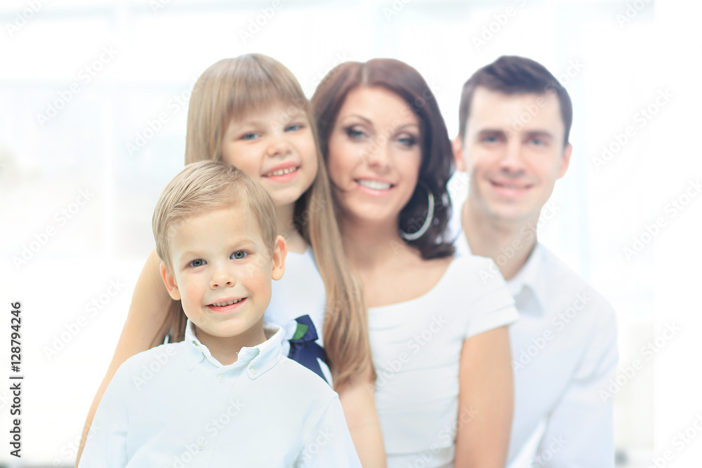 Beautiful happy family - isolated over a white background Beautiful happy family - isolated over a white background