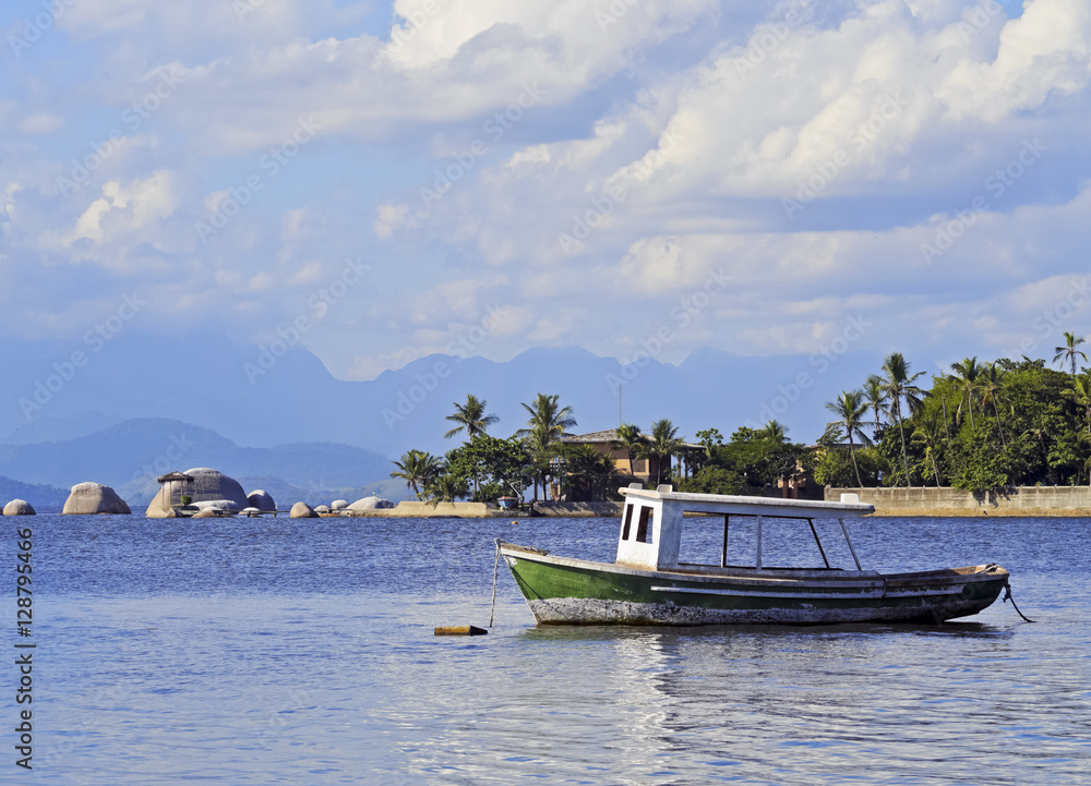 Brazil, State of Rio de Janeiro, Guanabara Bay, Paqueta Island, Boat near the coast of the island. Brazil, State of Rio de Janeiro, Guanabara Bay, Paqueta Island, Boat near the coast of the island.