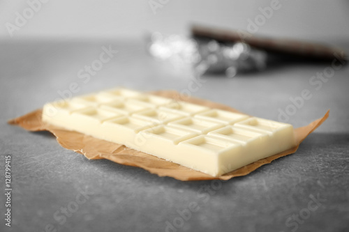 Chocolate bar on grey table