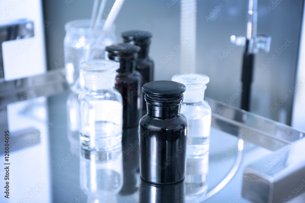 Glass bottles with medicines in gynecological room Glass bottles with medicines in gynecological room