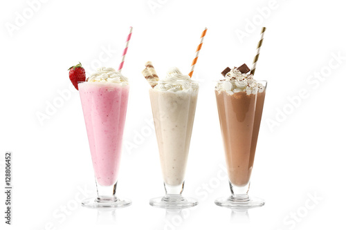 Fotografiet Delicious milkshakes isolated on white